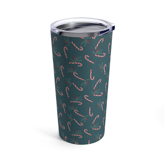 20oz tumbler featuring a candy cane and holly holiday pattern, perfect for adding a festive touch to your drinks during the holiday season.