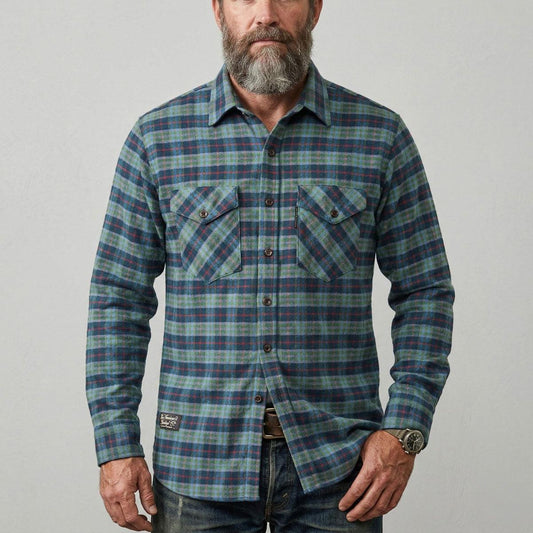 Men's Forest Green Plaid Vermont Flannel shirt on male model on a white background.