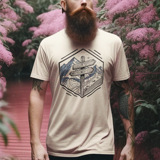 Wilderness Way Trail Sign T-Shirt worn by a model, featuring a minimalist geometric trail signpost and mountain path design—perfect for hikers and outdoor adventurers.
