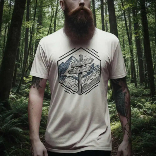 Wilderness Way Trail Sign T-Shirt worn by a model, featuring a minimalist geometric trail signpost and mountain path design—perfect for hikers and outdoor adventurers.
