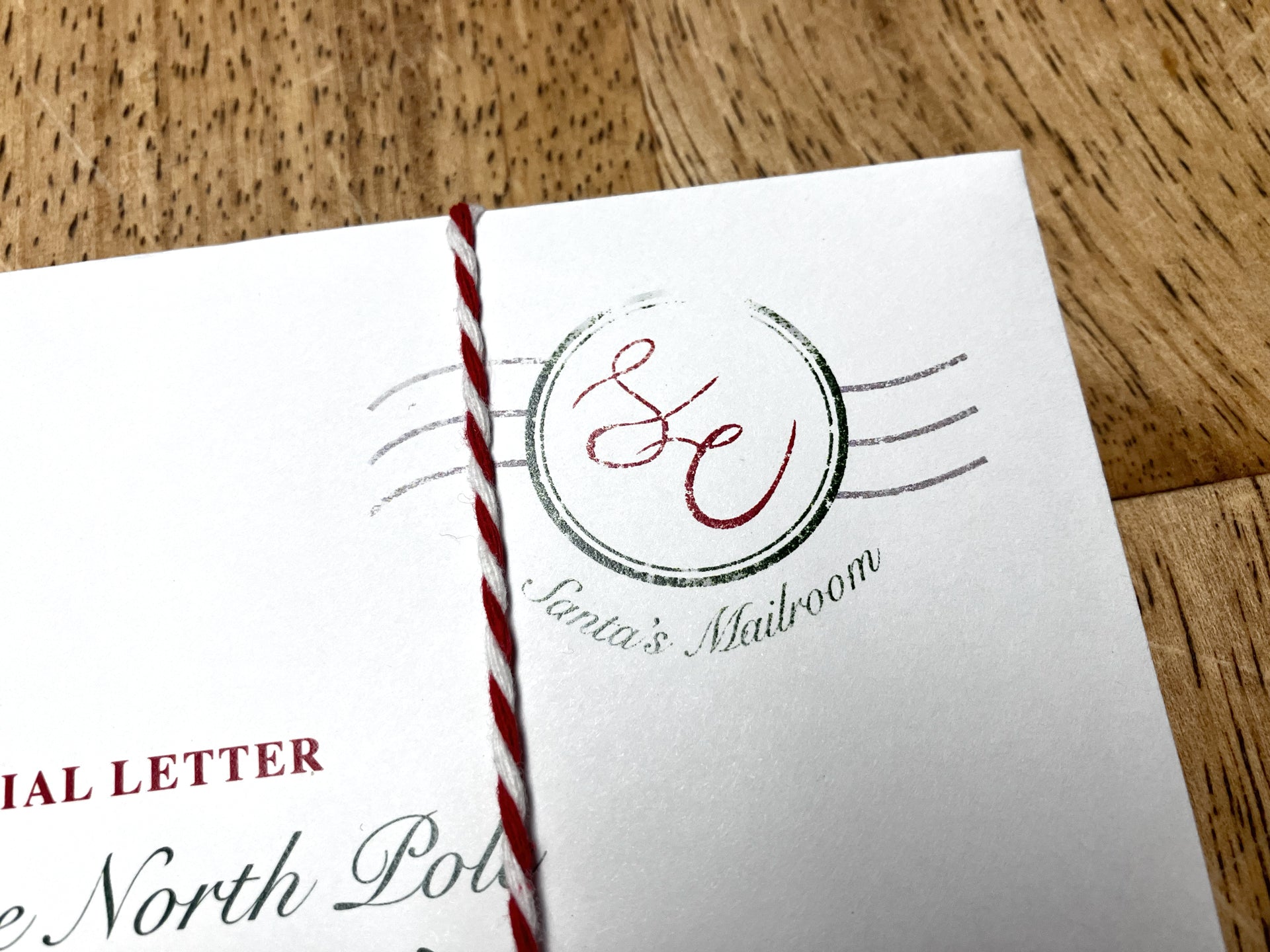 close up of envelope detail of Santa's Mailroom stamp.