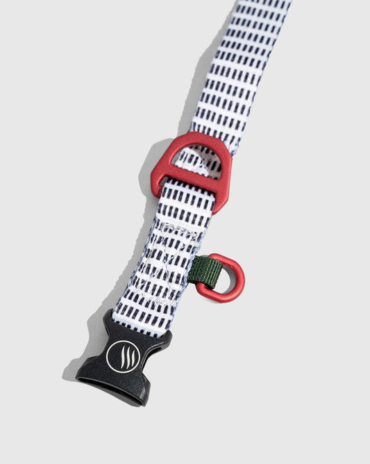 Crafted from 100% (R)evolution™ recycled polyester made from post-consumer plastic bottles the Recycled Woven Dog Collar in Shortbread from United By Blue is displayed on a white background.