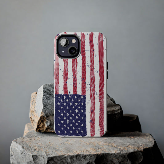 Illustrated American flag design on an iPhone and Samsung phone case, placed on a rock, highlighting its rugged and patriotic style.