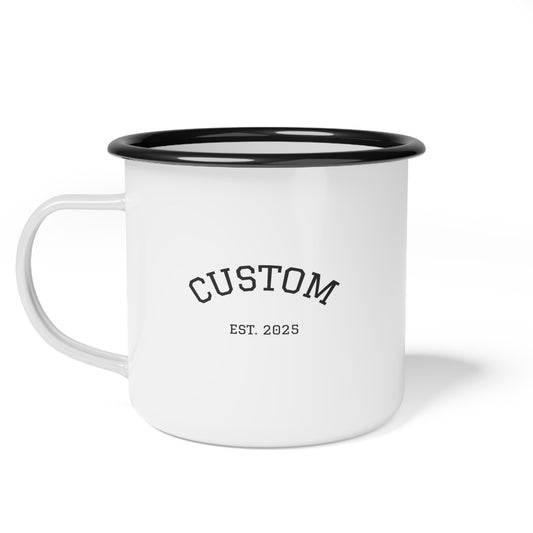 White enamel mug with black rim and 'CUSTOM EST. 2025' text on a white background showcasing the personalization potential.