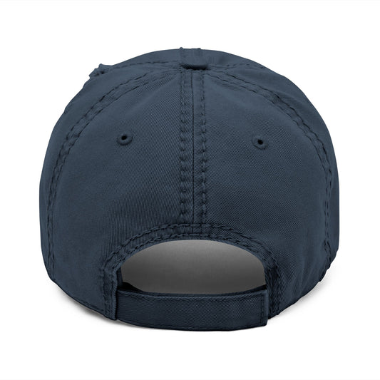 Back view of navy option of the Distressed Fishing Fly Dad Hat on a white background, highlighting the adjustable strap and relaxed, unstructured fit.