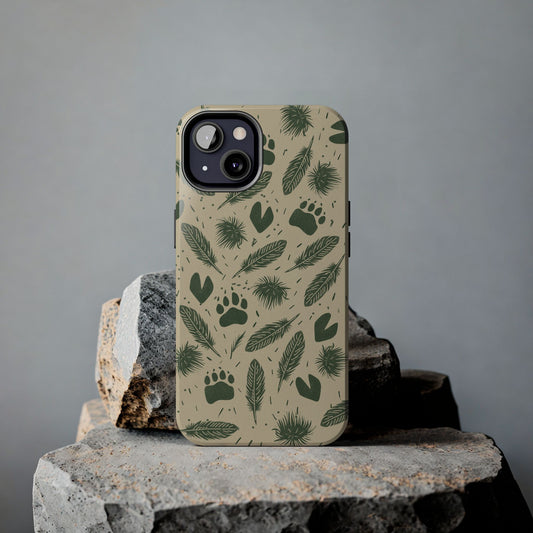 Feathers, Fur & Footprints Phone Case resting on a rock with a grey background, showcasing nature-inspired track and texture illustrations.