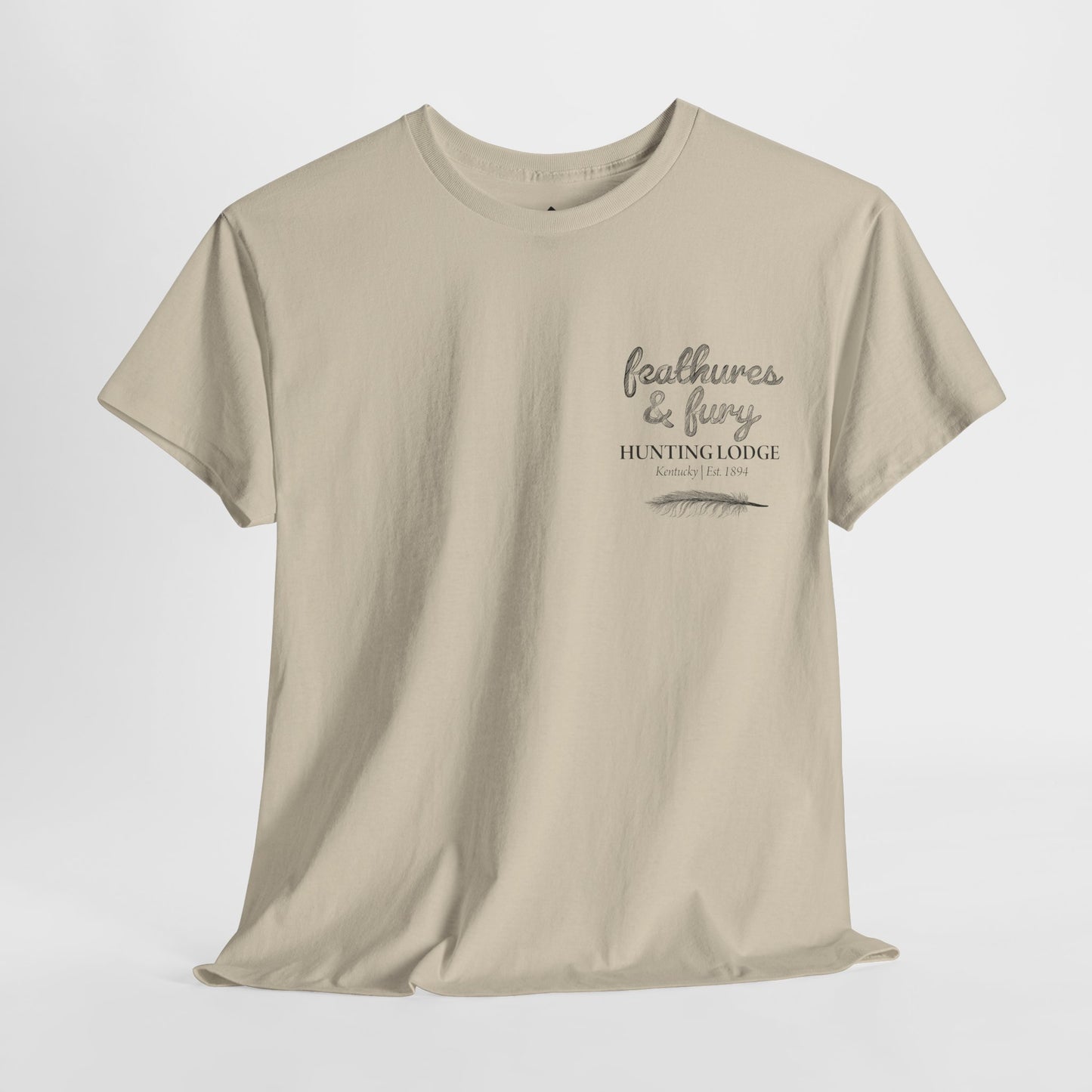 Sand color Feathers & Fury Hunting Lodge Tee front view on a white background, featuring a rugged turkey hunting design, perfect for outdoor and hunting enthusiasts.