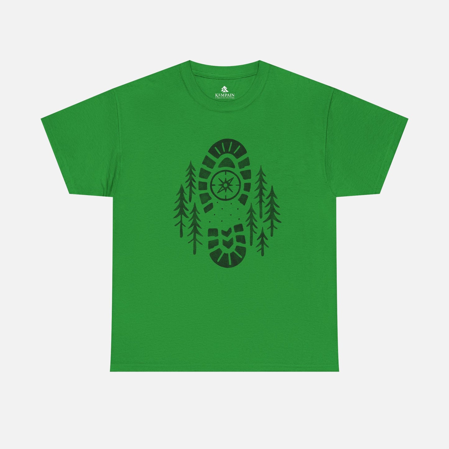 Irish Green Boot Print Compass Forest T-Shirt worn by model in a pine forest setting, showcasing rugged hiking design for nature lovers.