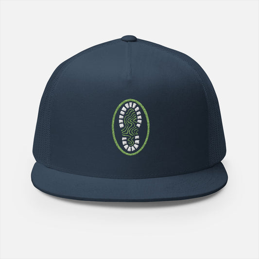 Front view of the Hiking Boot Typography Trucker Cap in navy on a white background, featuring a bold hiking boot filled with intricate typographic linework and outdoor-themed details.