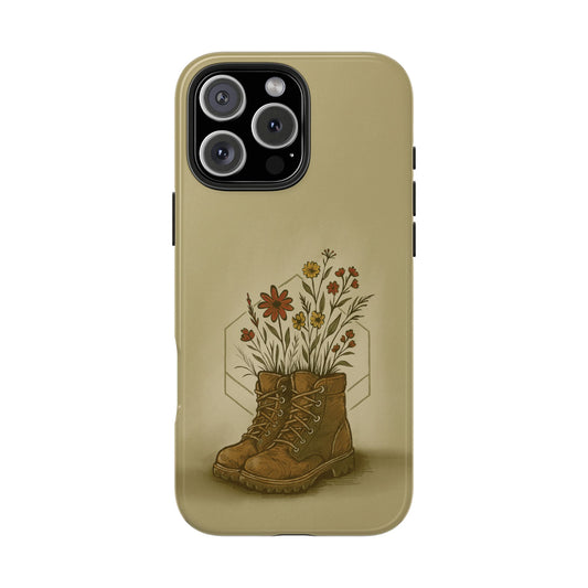 Hiking Boots with Wildflowers Phone Case featuring illustrated boots filled with blooming flowers, symbolizing outdoor adventure and nature on a white background.