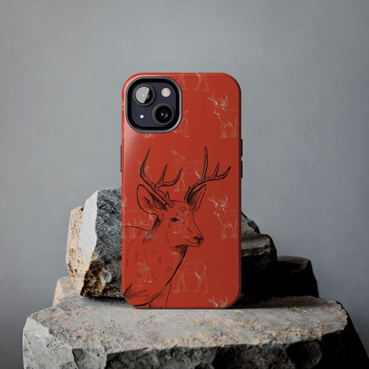 Lifestyle image of a phone case for iPhone and Samsung models with a hunter orange background and buck antlers design, placed on a rock in an outdoor setting, ideal for hunters and nature lovers.