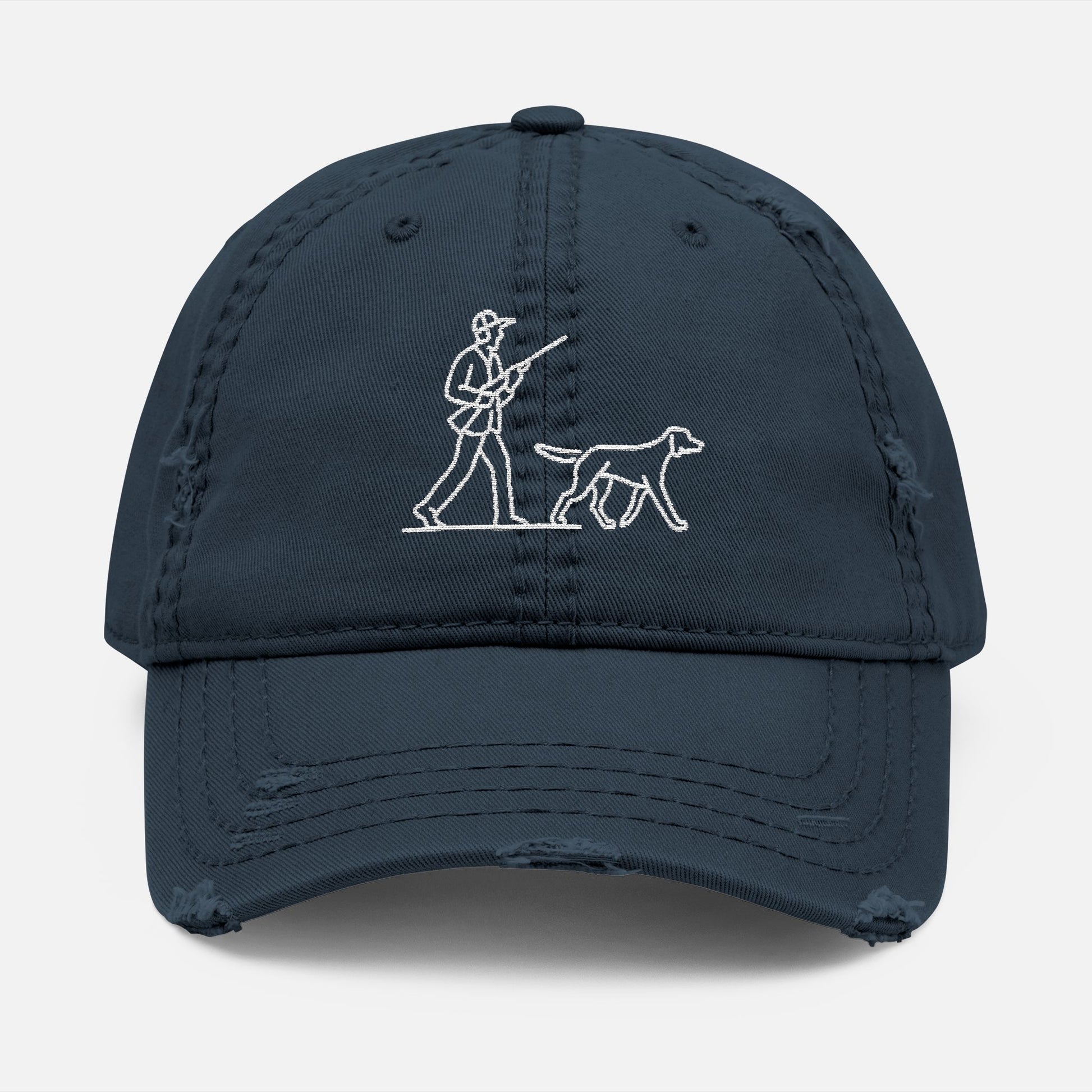 Front view of navy low-profile dad hat with line art embroidery of a hunter and dog in classic outdoor scene.