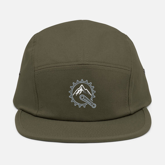 Front view of olive 5-panel cap featuring embroidered mountain and bike crank design in metallic silver and white.