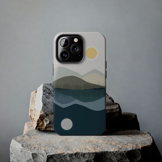 Phone case with an abstract mountain and lake reflection illustration, displayed on a rock against a gray background, designed for iPhone and Samsung models.