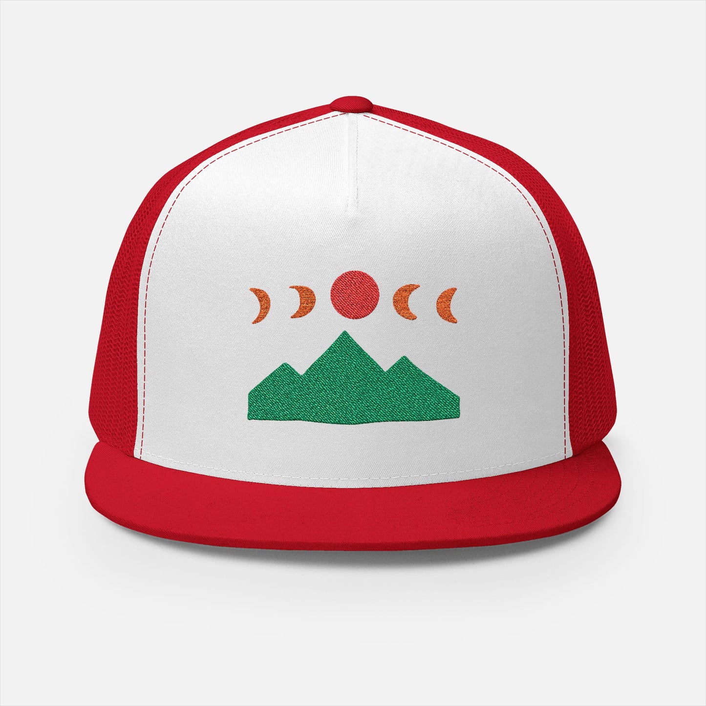 Front of Mountain Ridge and Moon Phase red trucker cap showing the embroidery design of mountain ridges and moon phases in a minimalist style by Kempain Family Outfitters.