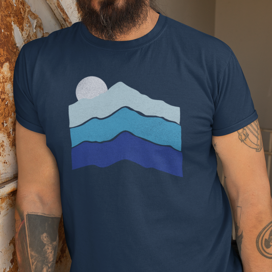 Person wearing Mountain Ridge Fade Tee on a scenic trail