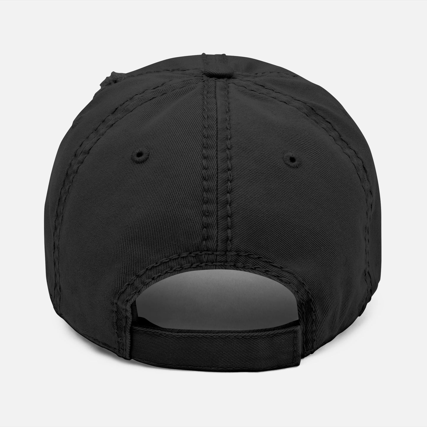 Back view of black rustic-style dad hat with adjustable strap, showcasing classic unstructured fit for casual outdoor wear.
