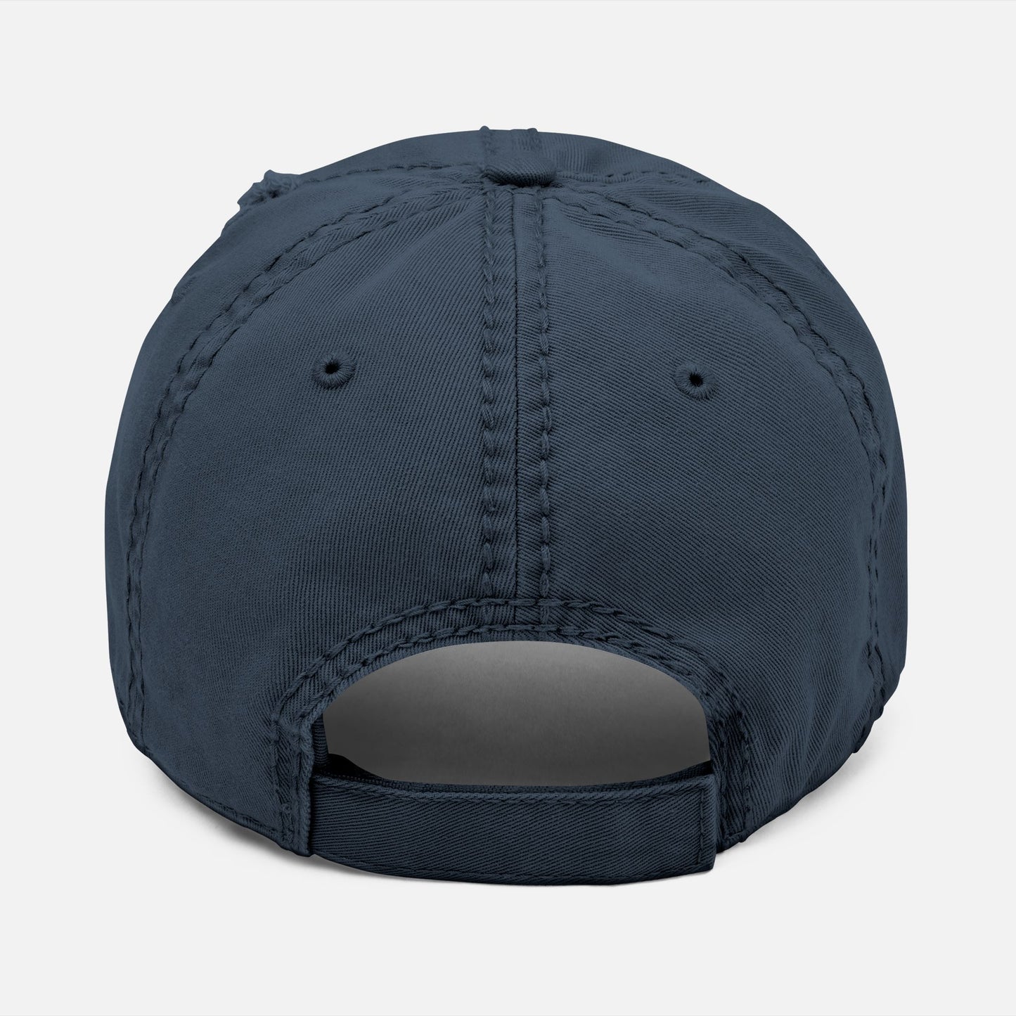 Back view of navy rustic-style dad hat with adjustable strap, showcasing classic unstructured fit for casual outdoor wear.