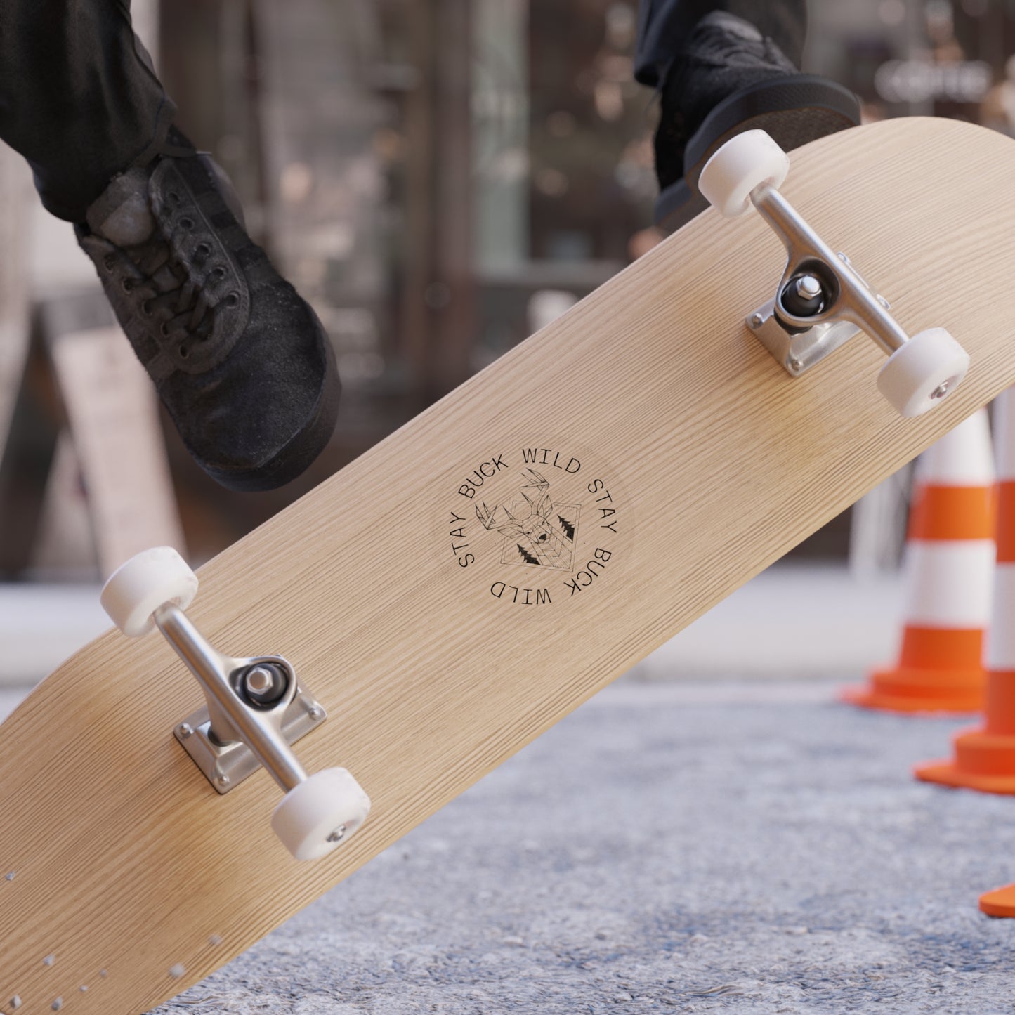Skateboard with a visible stay buck wild sticker on a blurred background