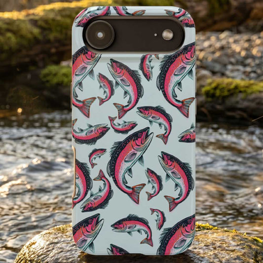 A colorful Rainbow Trout Pattern case showcasing an illustrated jumping trout by Jordan Kempain displayed on a river rock.