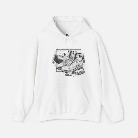 Trek & Trail Hoodie in white displayed on a white background, showcasing the detailed hiking boot and trail illustration.