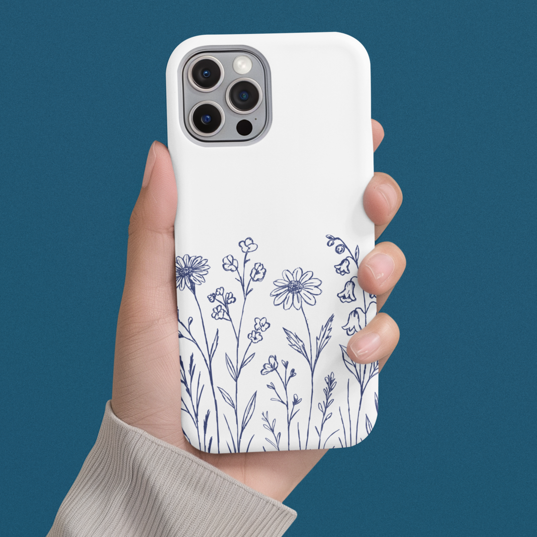 Wildflower Blue Phone Case held in hand, highlighting minimalist wildflower illustration in soft blue tones.
