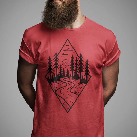 Red Winding Path Tee on model showcasing a minimalist design of winding path, towering trees, and the quiet serenity of the forest, the Trailblazer Tee features our Timberline Trails hand-drawn nature path illustration.