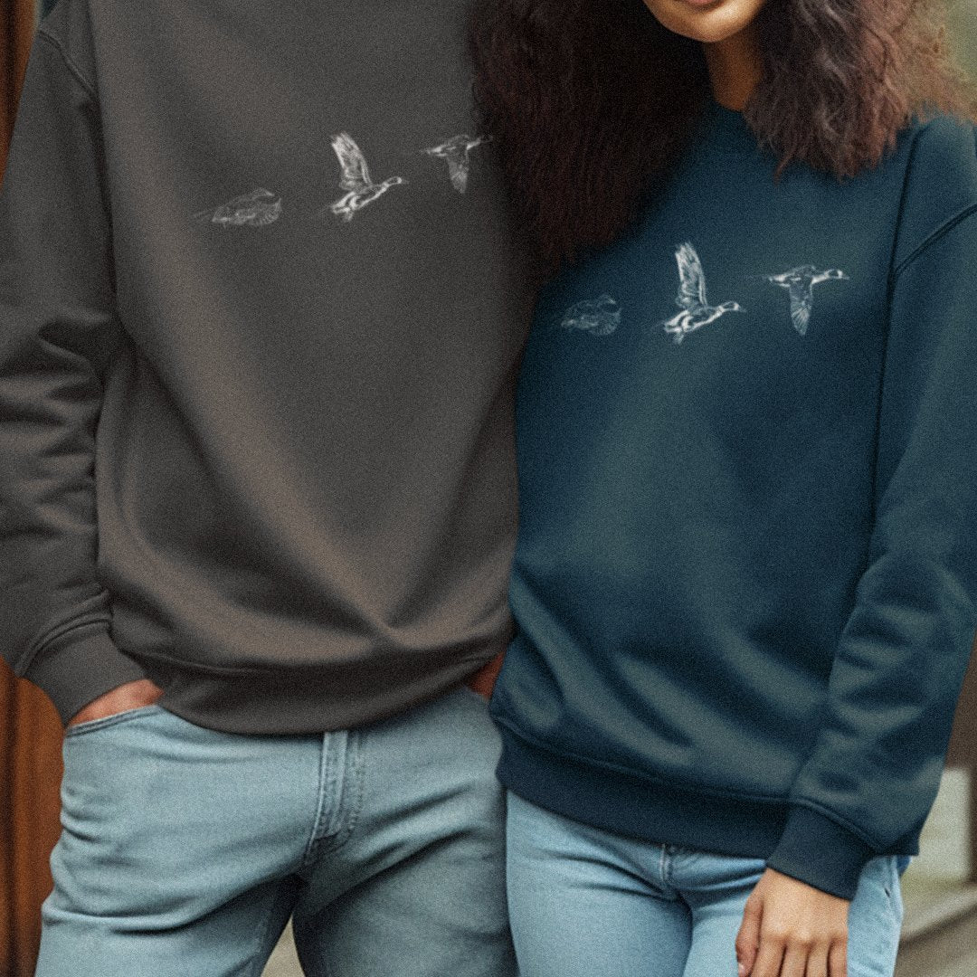 A collection of apparel and goods with waterfowl matching designs