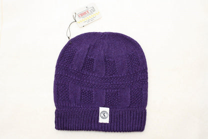 100 percent baby alpaca knit winter hat by Purely Alpaca in Purple color option displayed on a white background.