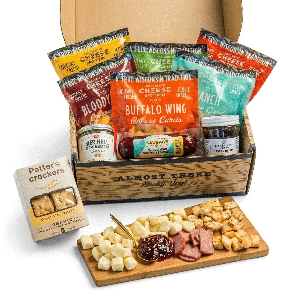 Wisconsin Cheese Curd and Summer Sausage Gift Box with Gourmet Jam, Mustard, and Organic Crackers curated by Kempain Family Outfitters.
