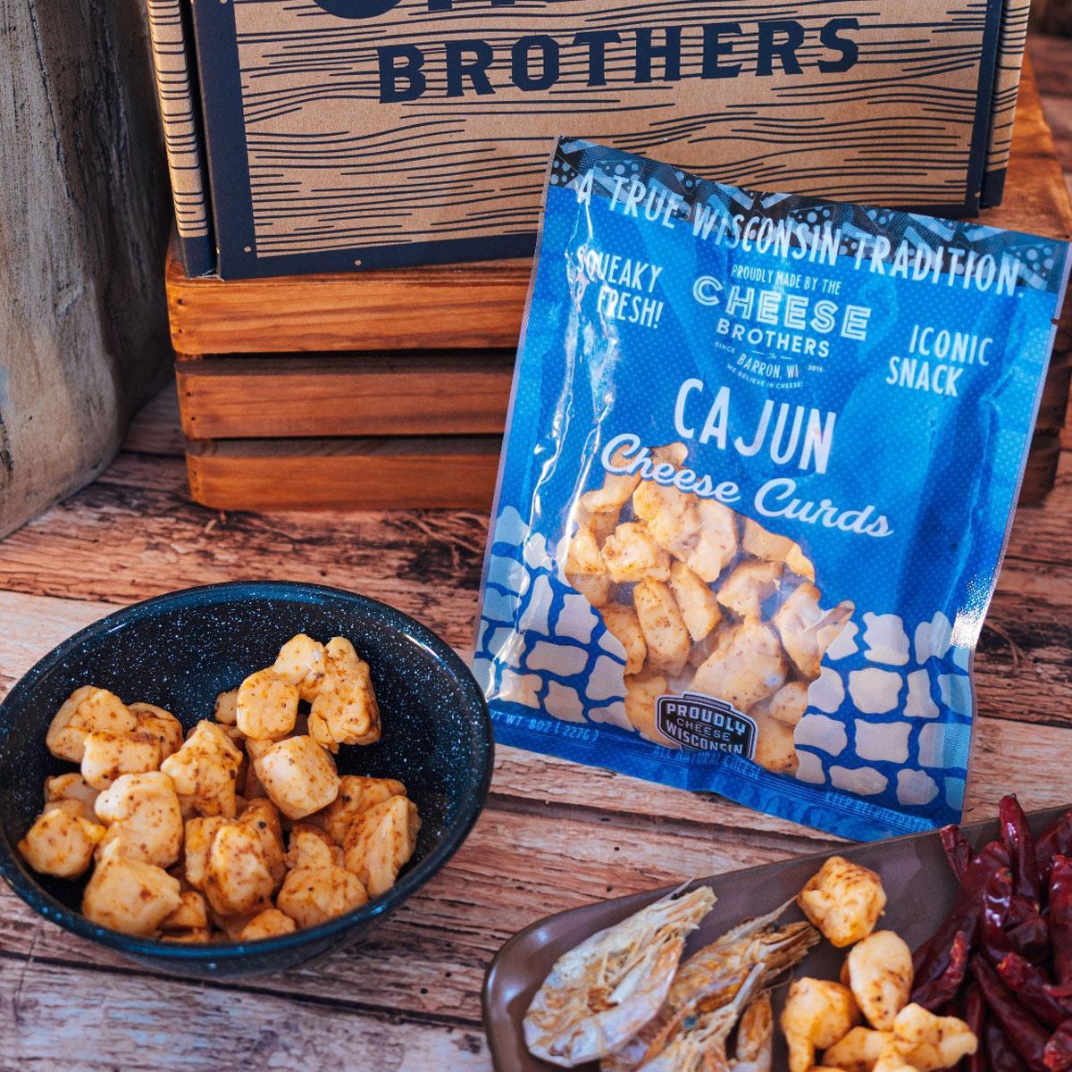 Wisconsin Cheese Curd and Summer Sausage Gift Box with Gourmet Jam, Mustard, and Organic Crackers curated by Kempain Family Outfitters.