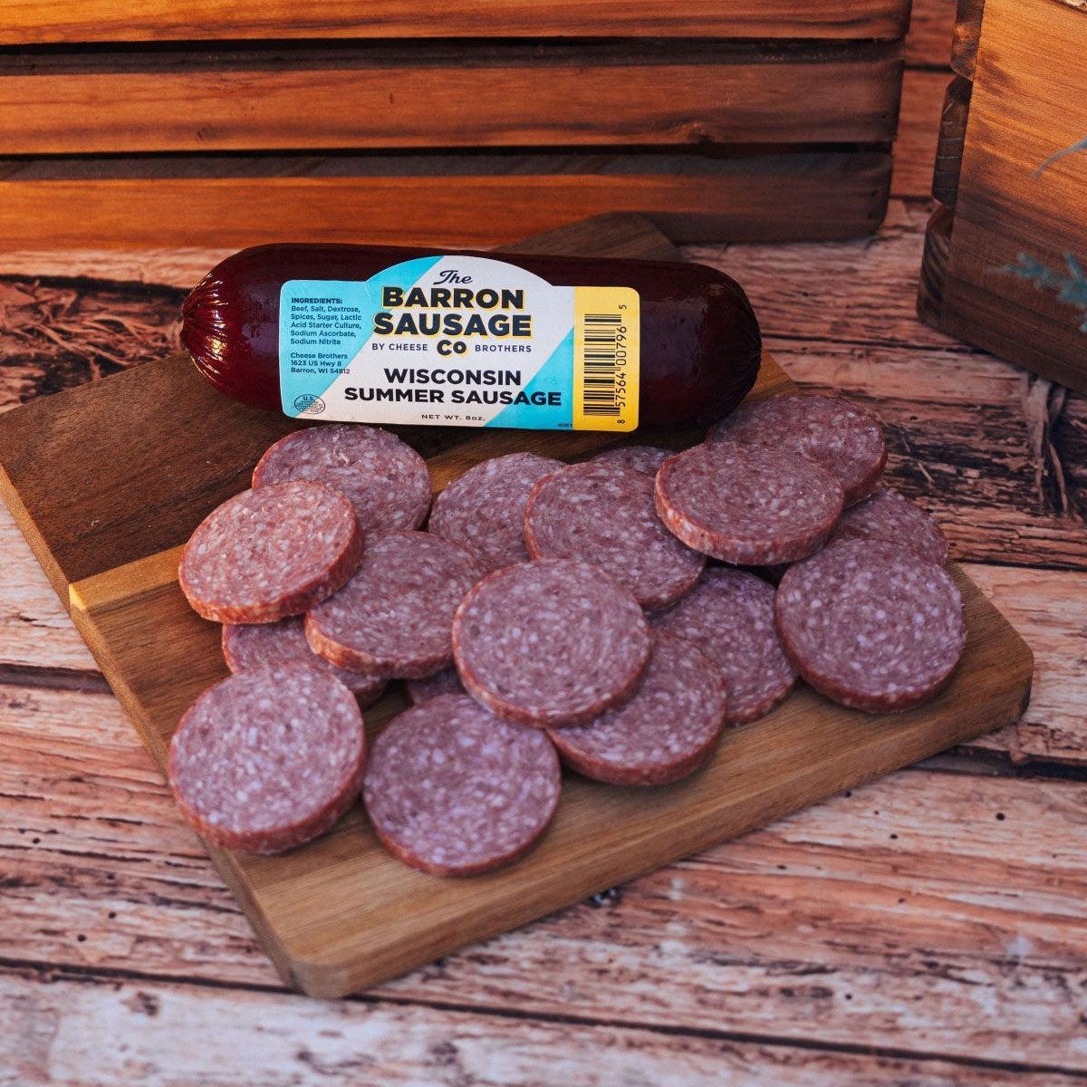 Wisconsin Cheese Curd and Summer Sausage Gift Box with Gourmet Jam, Mustard, and Organic Crackers curated by Kempain Family Outfitters.