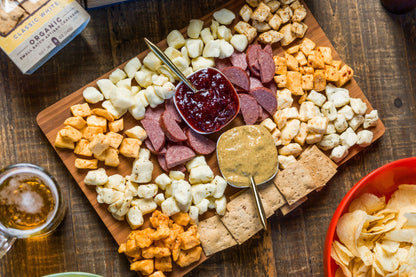 Wisconsin Cheese Curd and Summer Sausage Gift Box with Gourmet Jam, Mustard, and Organic Crackers curated by Kempain Family Outfitters.