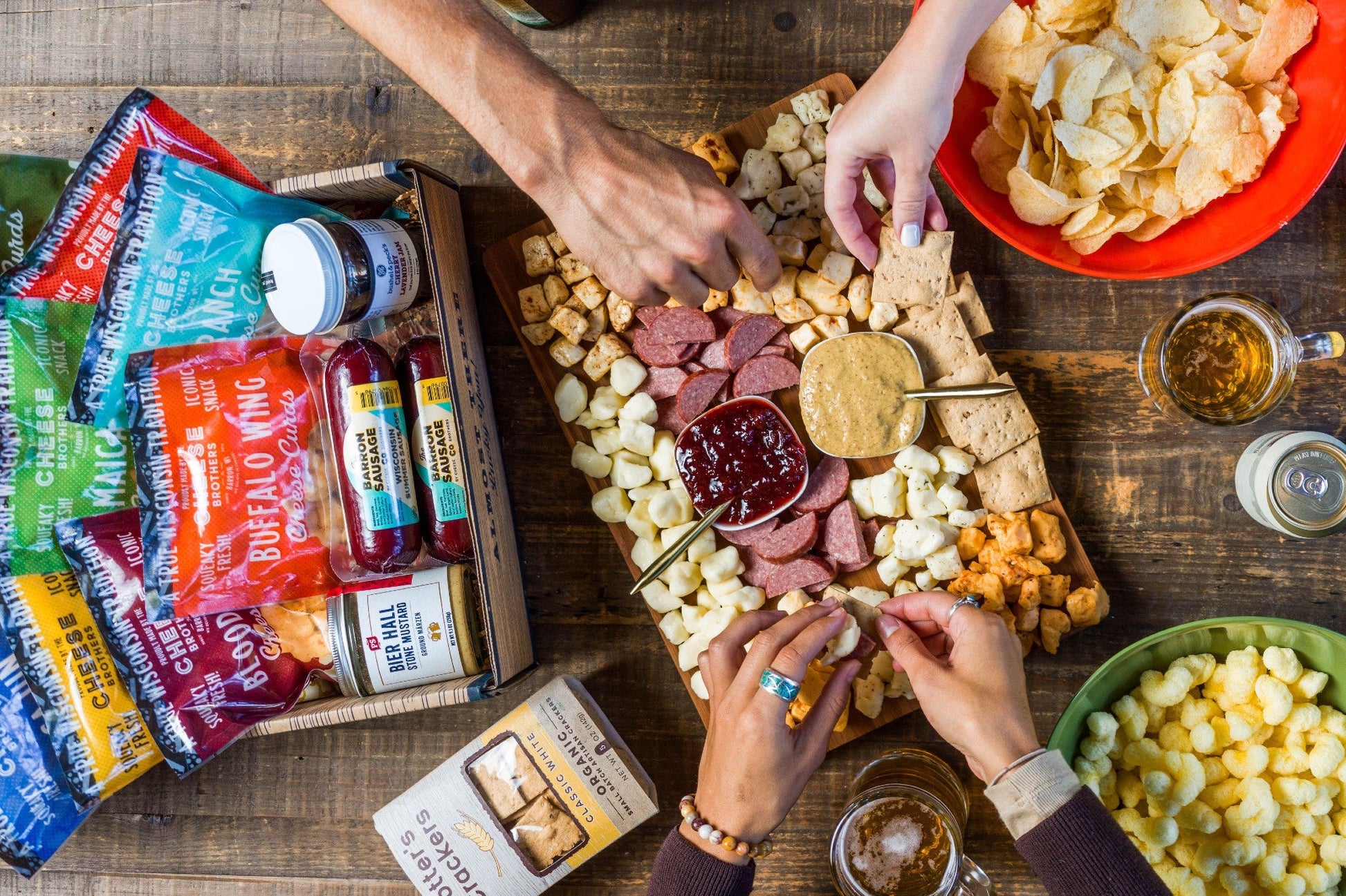 Wisconsin Cheese Curd and Summer Sausage Gift Box with Gourmet Jam, Mustard, and Organic Crackers curated by Kempain Family Outfitters.
