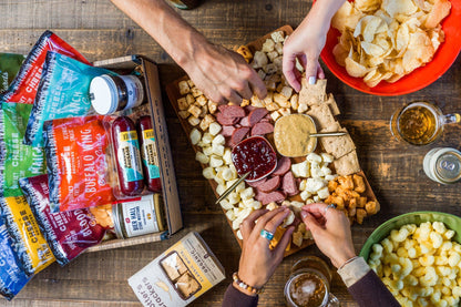 Wisconsin Cheese Curd and Summer Sausage Gift Box with Gourmet Jam, Mustard, and Organic Crackers curated by Kempain Family Outfitters.