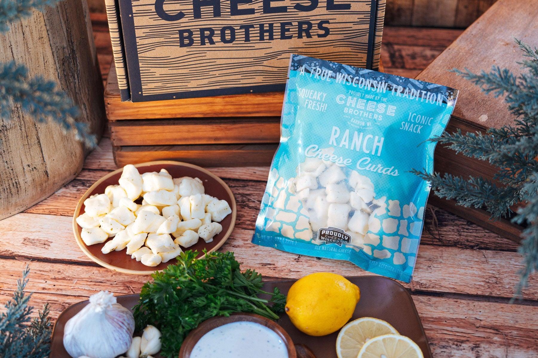 Wisconsin Cheese Curd and Summer Sausage Gift Box with Gourmet Jam, Mustard, and Organic Crackers curated by Kempain Family Outfitters.