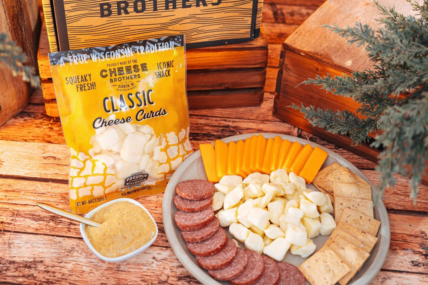 Wisconsin Cheese Curd and Summer Sausage Gift Box with Gourmet Jam, Mustard, and Organic Crackers curated by Kempain Family Outfitters.