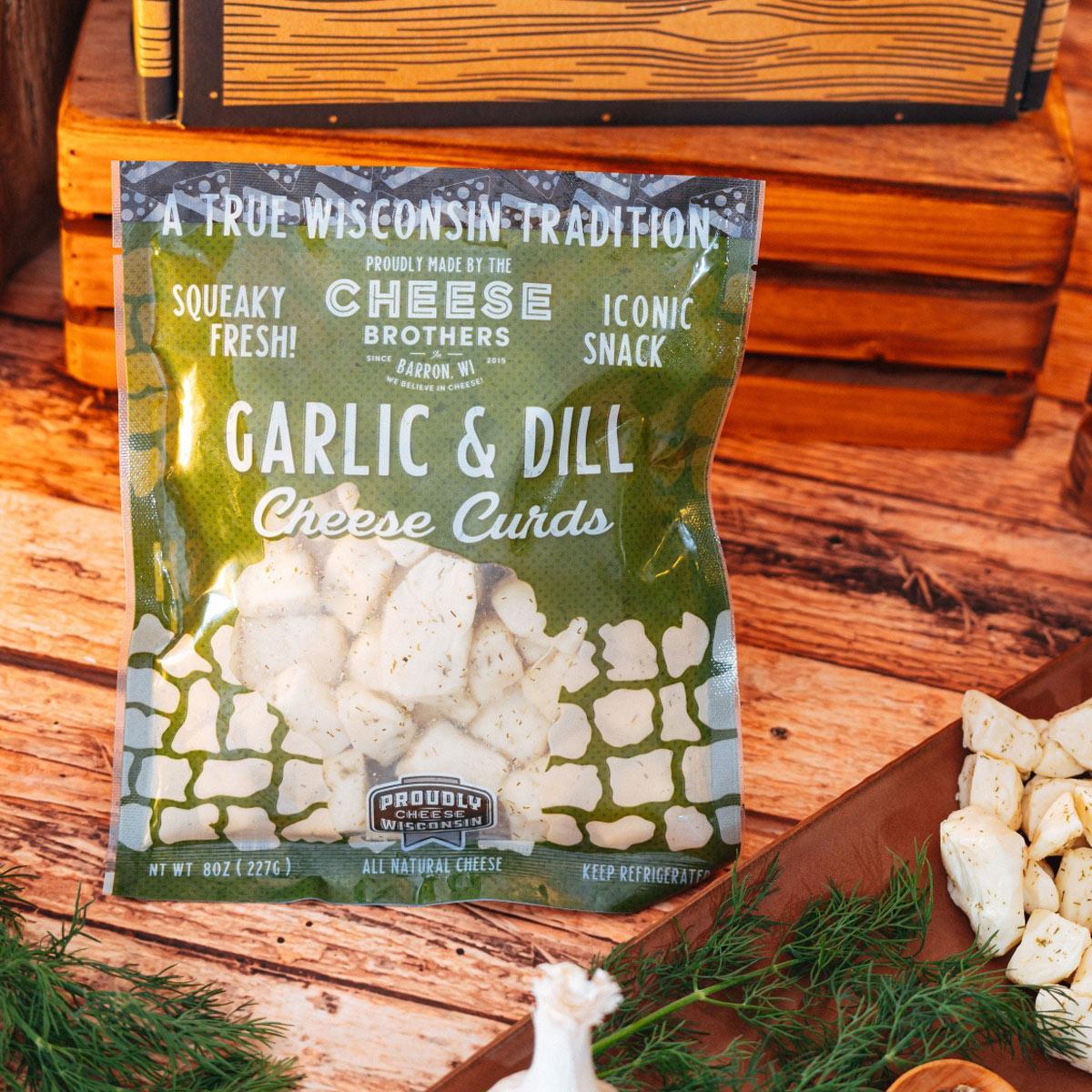 Wisconsin Cheese Curd and Summer Sausage Gift Box with Gourmet Jam, Mustard, and Organic Crackers curated by Kempain Family Outfitters.