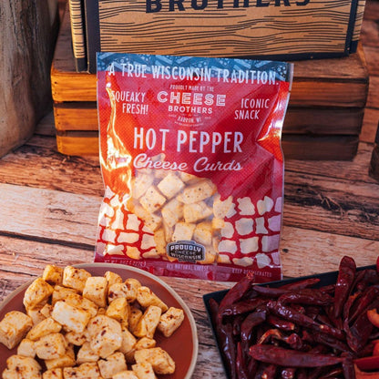 Wisconsin Cheese Curd and Summer Sausage Gift Box with Gourmet Jam, Mustard, and Organic Crackers curated by Kempain Family Outfitters.