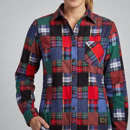 Multicolored plaid shirt by Vermont Flannel Company on a gray background.