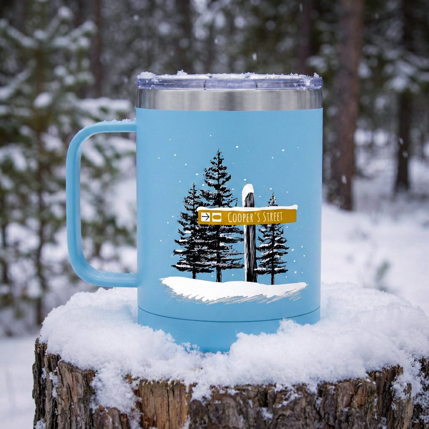 Light Blue Custom Ski Trail Signpost Commissioned 15oz Tumbler for Skiers and Snowboarders, Original Artwork by Jordan Kempain photographed in snow.