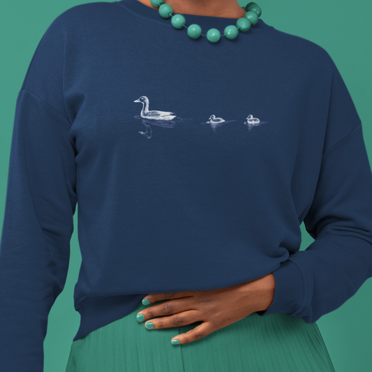 Model wearing Navy Blue Duck Family Minimalist Sweatshirt – Mommy Duck and Two Ducklings Design, Unisex Pullover, Cute Duck Print Jumper, Animal Lover Gift on white background.