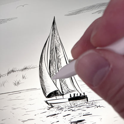Close-up of an artist drawing a sailboat and lighthouse nautical scene on an iPad using an Apple Pencil, showcasing the creative process behind a minimalist pen-and-ink illustration.