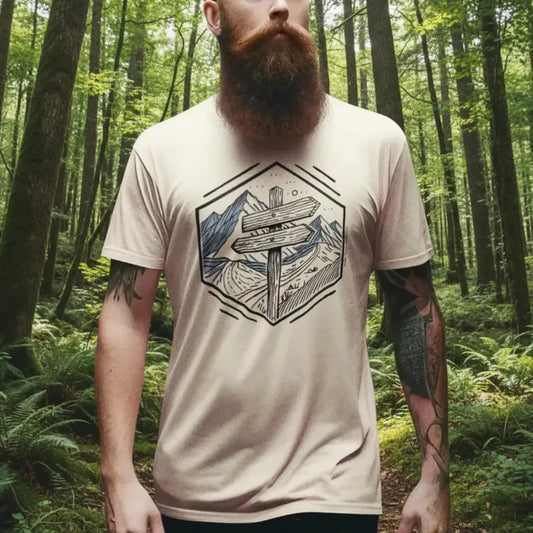 Wilderness Way Trail Sign T-Shirt worn by a model, featuring a minimalist geometric trail signpost and mountain path design—perfect for hikers and outdoor adventurers.