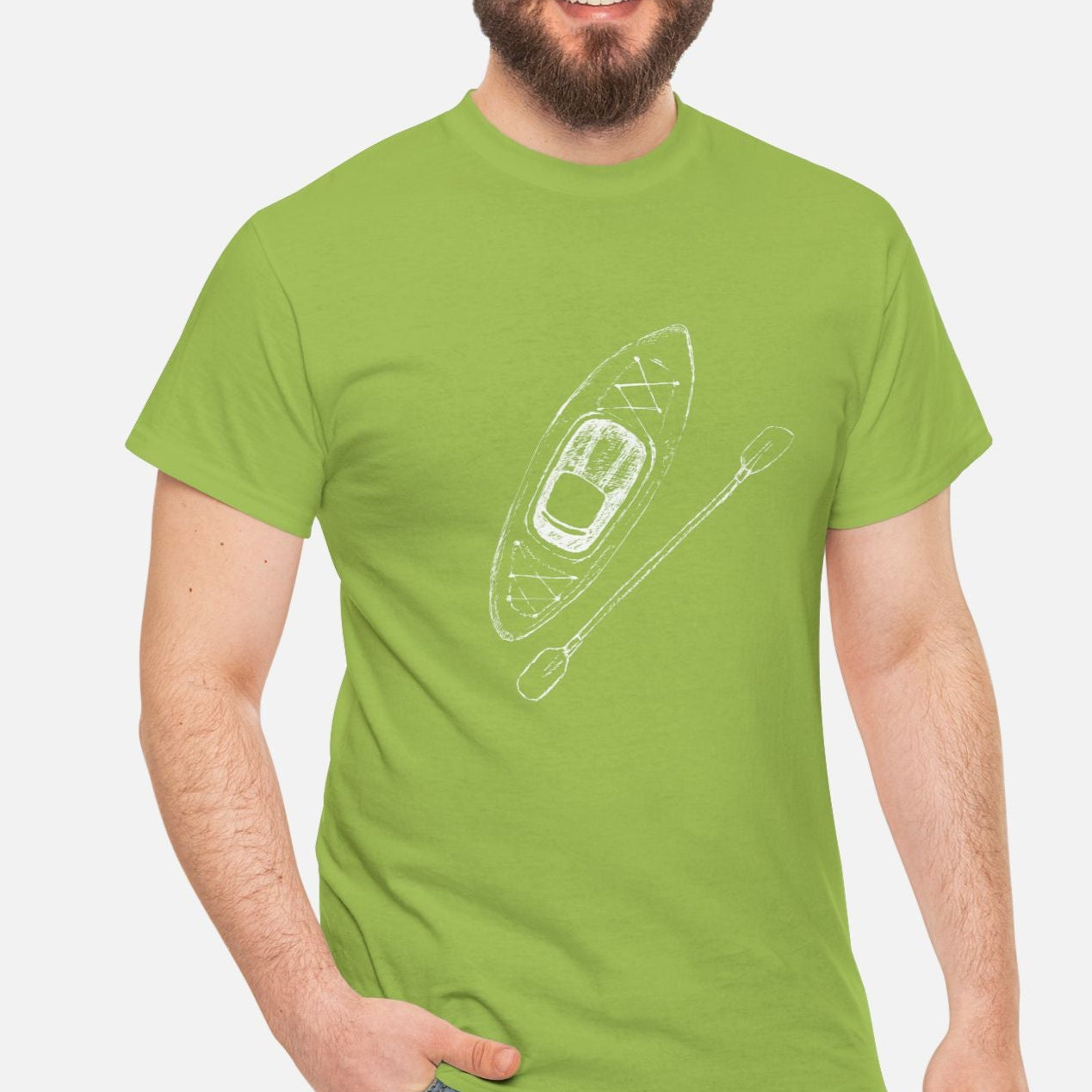 A green t-shirt on white background with a kayak and paddle graphic on front. 
