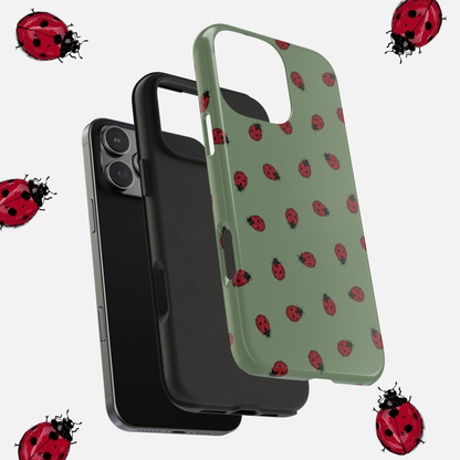 Foliage green phone case with a hand-illustrated ladybug pattern – durable, stylish, and nature-inspired accessory for your device on white background with exploded view to see rubber lining and plastic shell.
