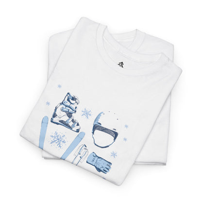 Folded white t-shirt with blue skiing icons on a white background