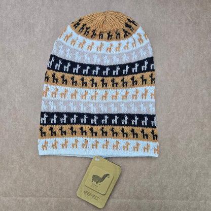 Gold color knitted Alpaca hat with Alpaca pattern on a brown background