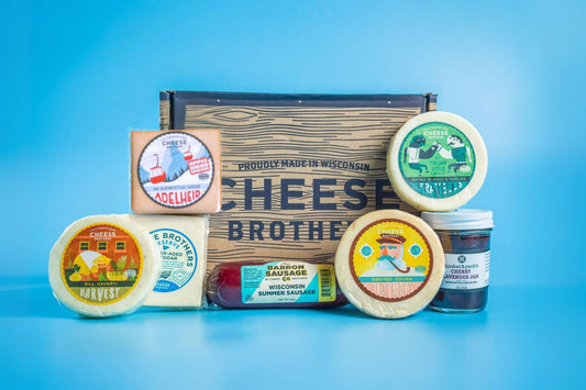 Collection of Wisconsin cheese products with 'Cheese Brothers' packaging on a blue background