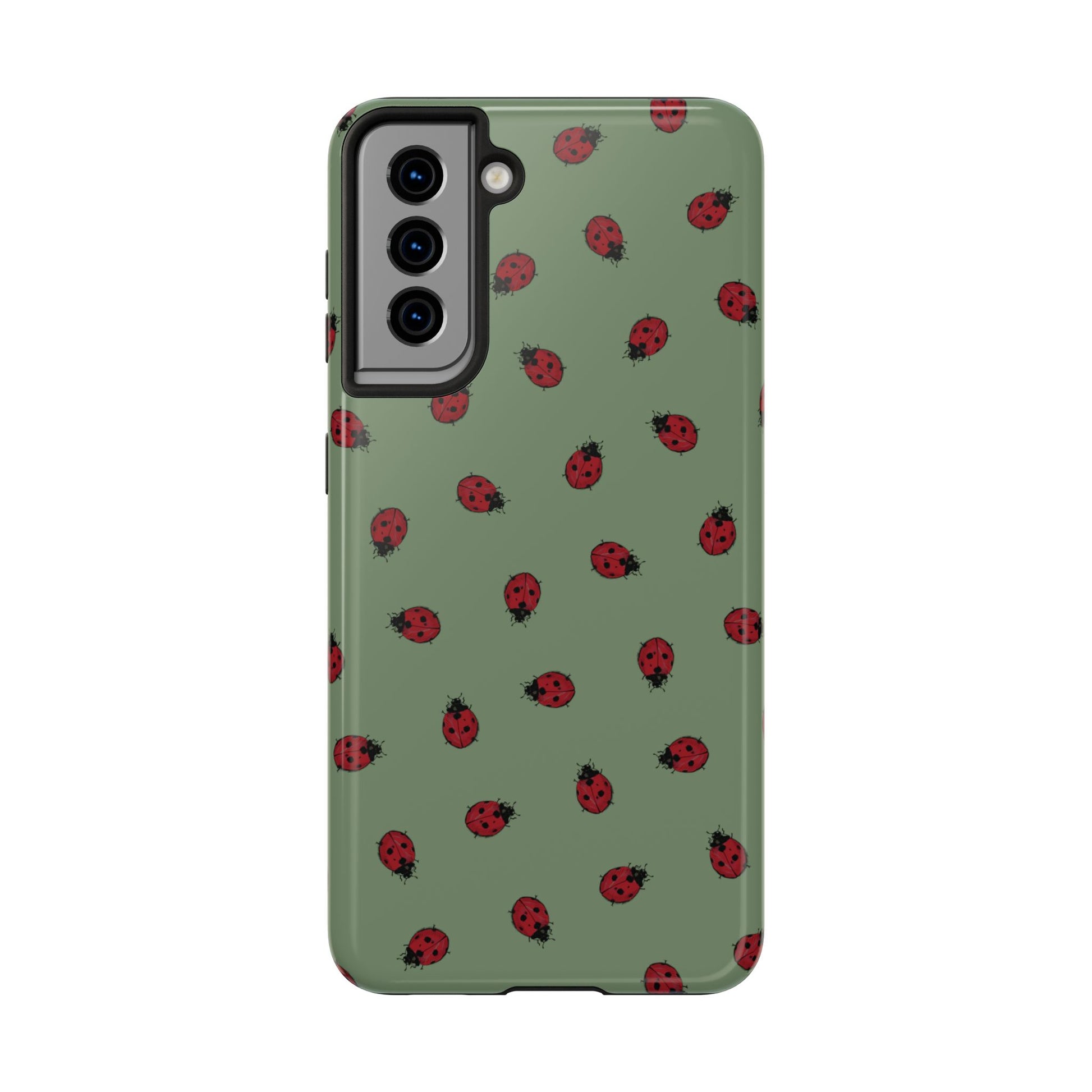 Phone case with ladybug pattern on a green background
